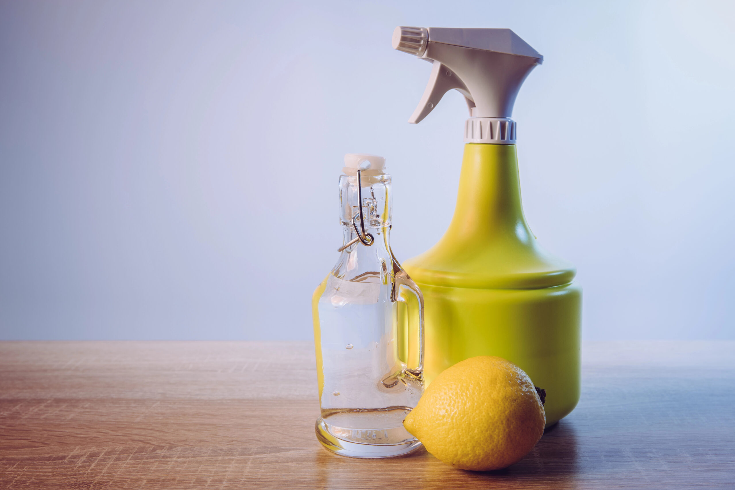 White vinegar and lemon with spray bottle